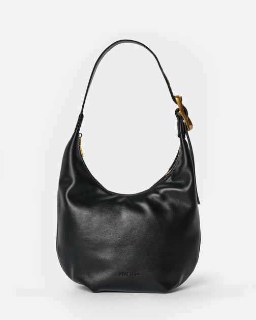 Gusset small pebble leather tote in black with white edge paint